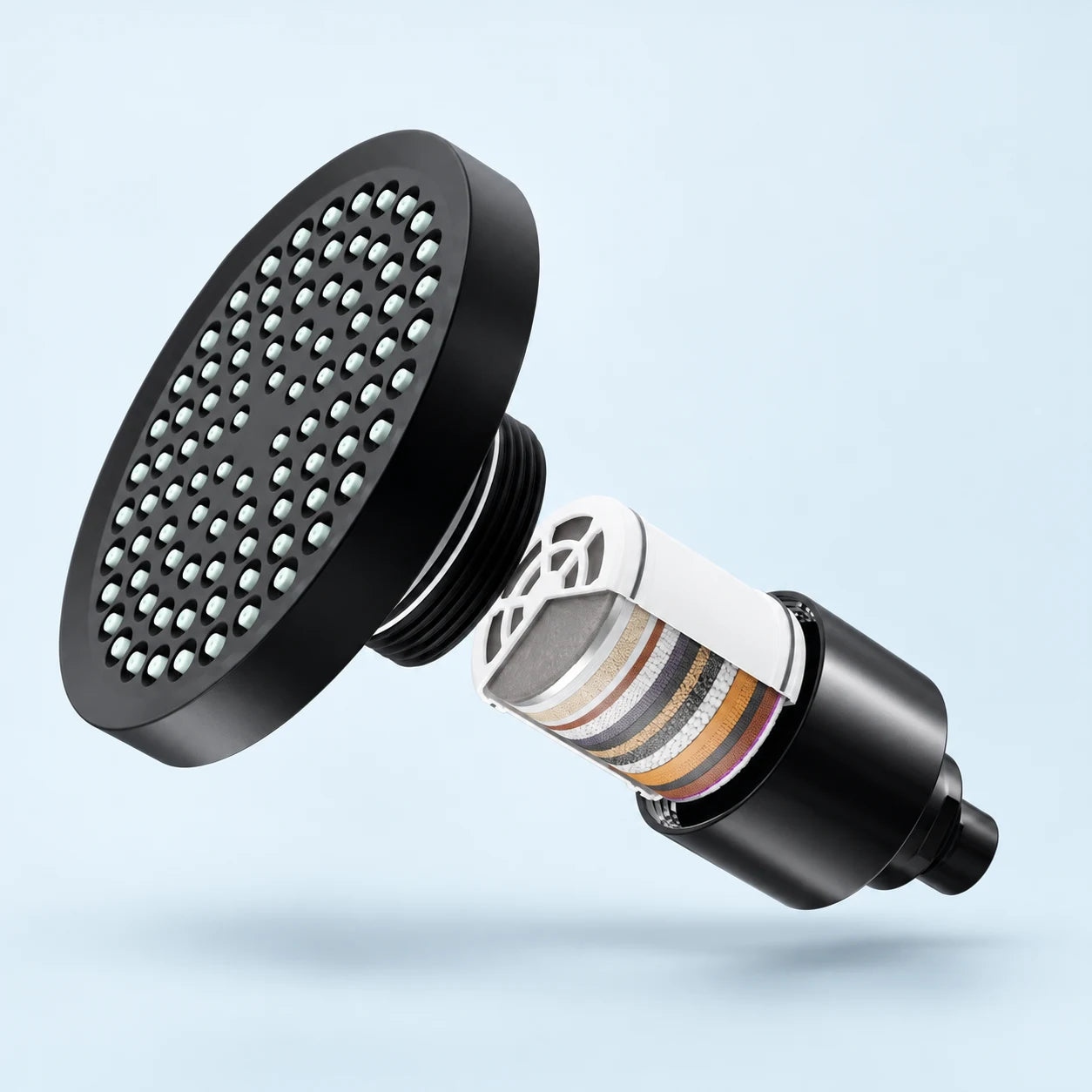 Illustrative replaceable cartridge inside the matte black showerhead